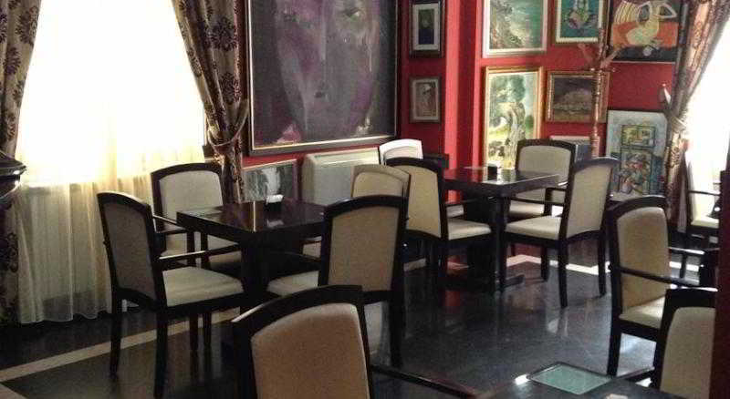 Art Hotel Nirvana Тирана Ресторан фото